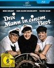 Drei Mann in einem Boot